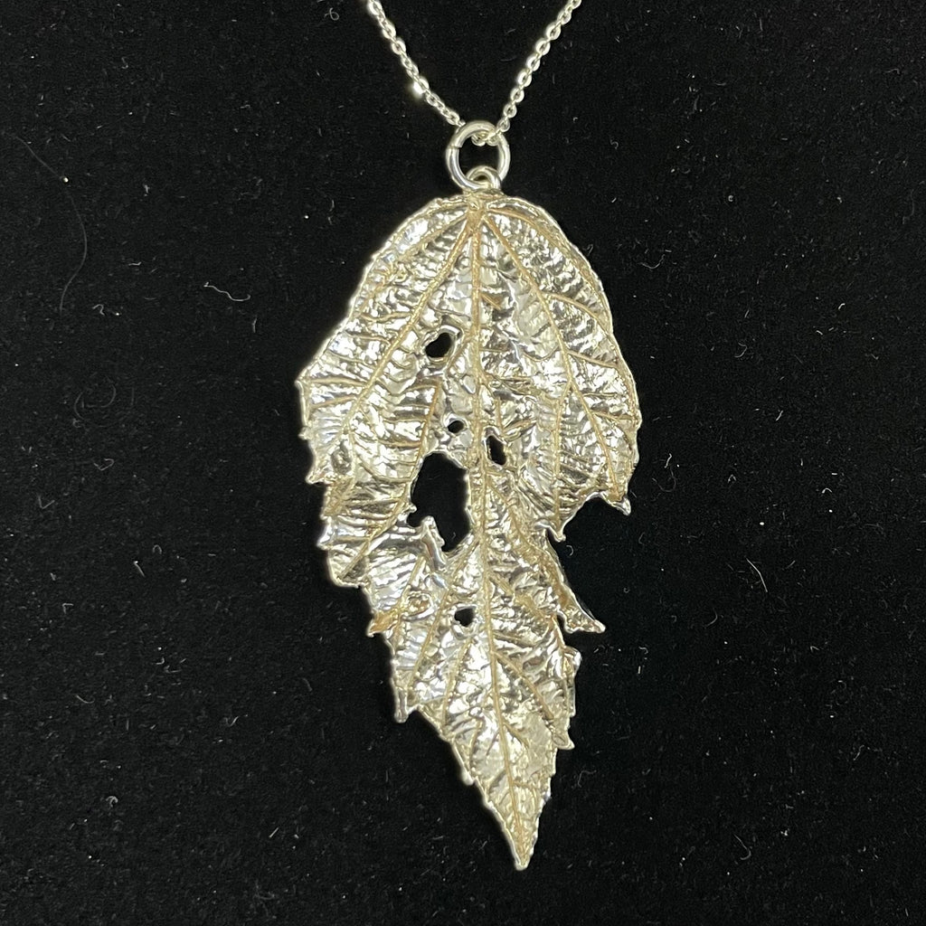 Caterpillar nibbled Bramble leaf pendant