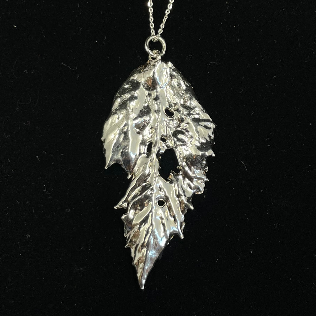 Caterpillar nibbled Bramble leaf pendant