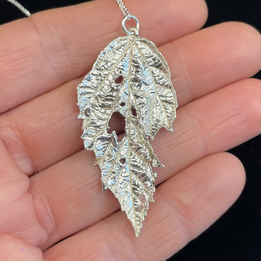 Caterpillar nibbled Bramble leaf pendant