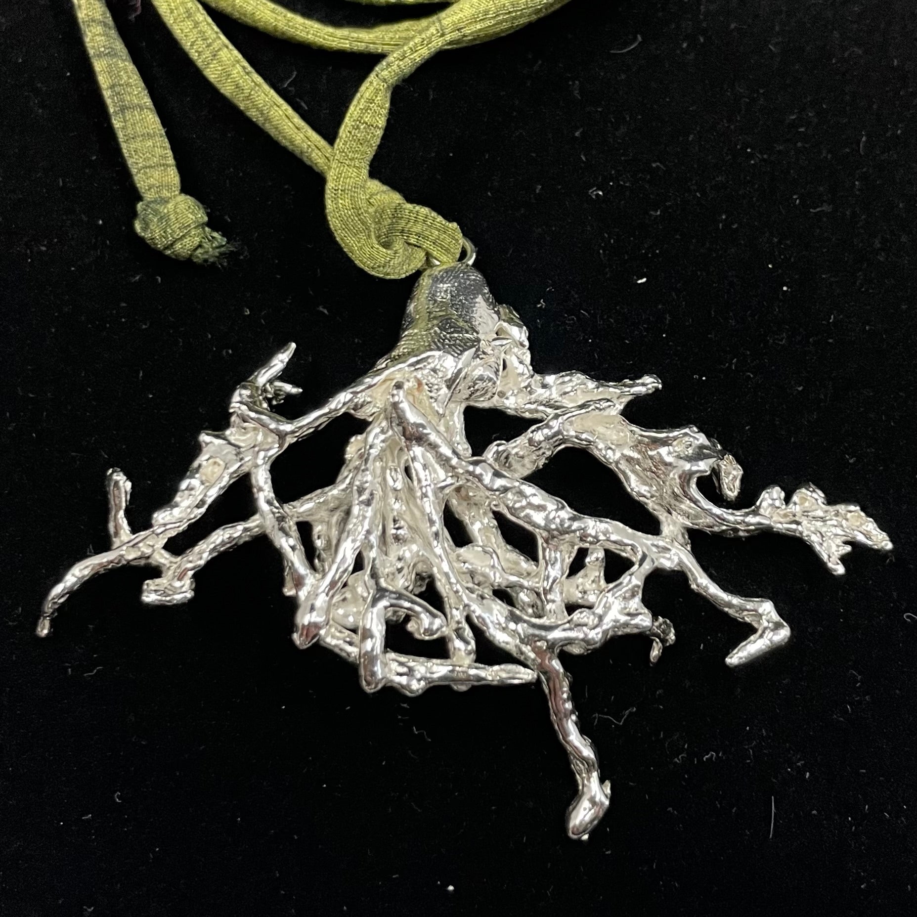 Fruticose Lichen pendant on recycled silk cord.