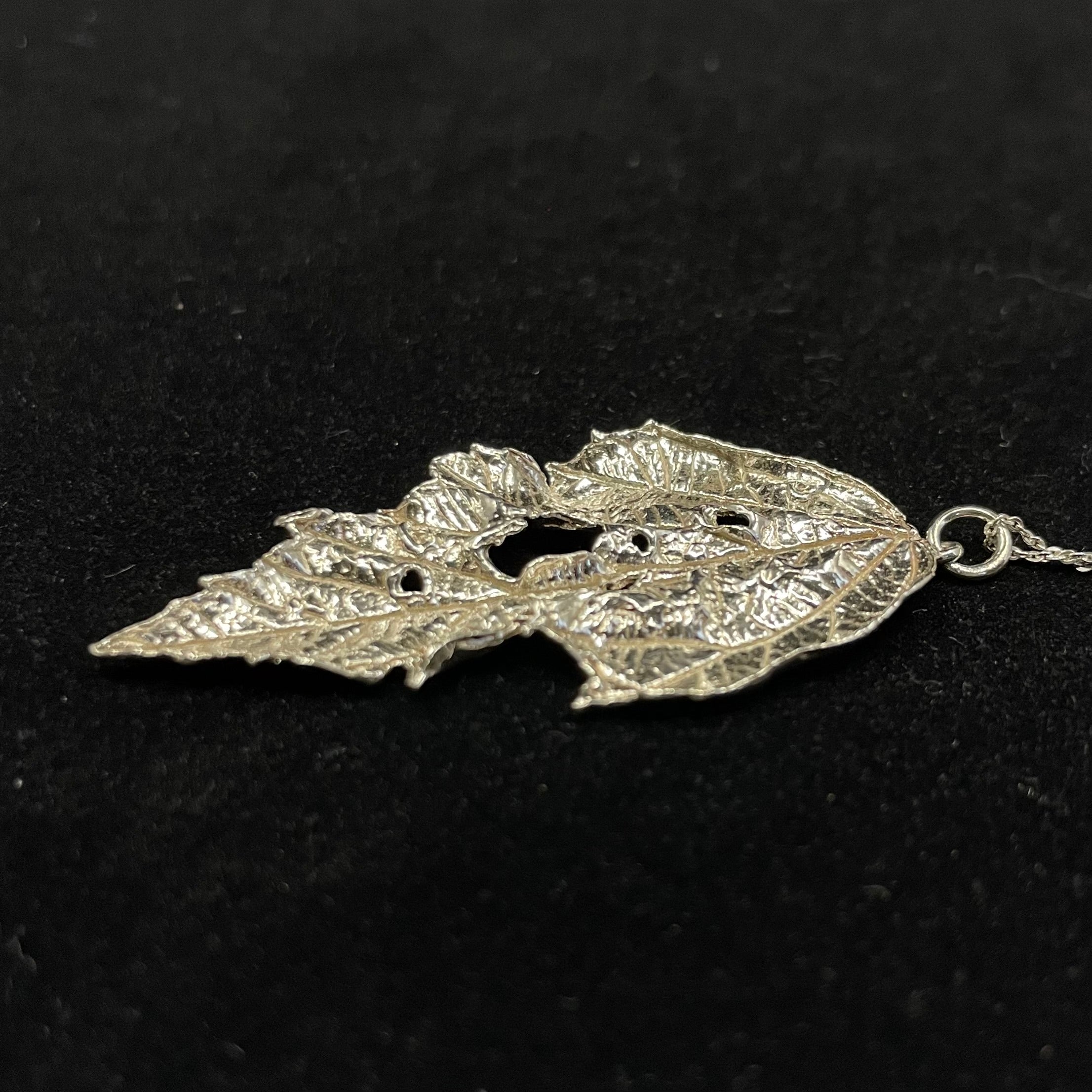 Caterpillar nibbled Bramble leaf pendant