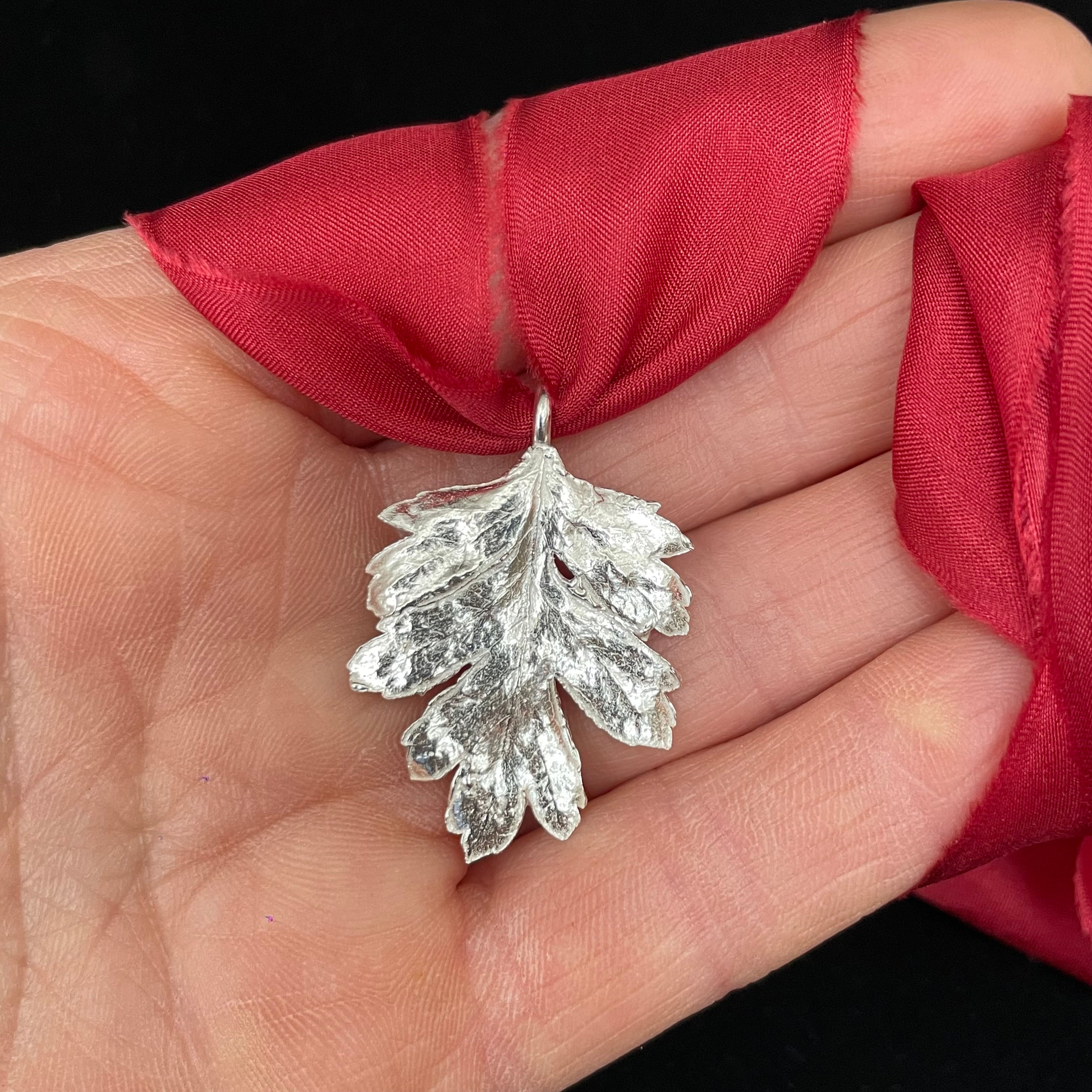 Hawthorn leaf pendant on silk ribbon